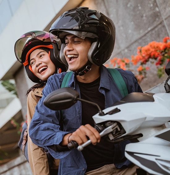 Couple riding a motorcycle